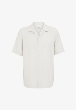 Rövid ujjú, galléros ing világos bézs színű, sima textúrájú anyagból; gombos elejével, több látható gombbal.