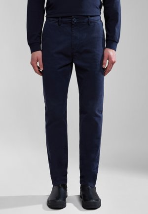Navy blue chinos with a slim fit, made from cotton blend material. Features a button closure, belt loops, and straight leg design.