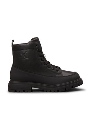 Black leather high-top boot with thick tread sole, lace-up front, and embossed CK logo on the side.