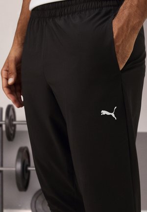 ESSENTIALS TAPERED PANT - Jogginghose - black