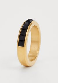 Gold metal ring with a smooth finish and a band of black cubic stones along one side, featuring a squared pattern for added texture.