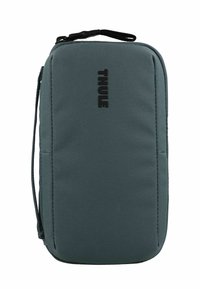 Sacchetto isolato Thule, tessuto blu scuro, chiusura con zip, forma rettangolare, stampa del logo frontale, cinturino per il polso per la portabilità.