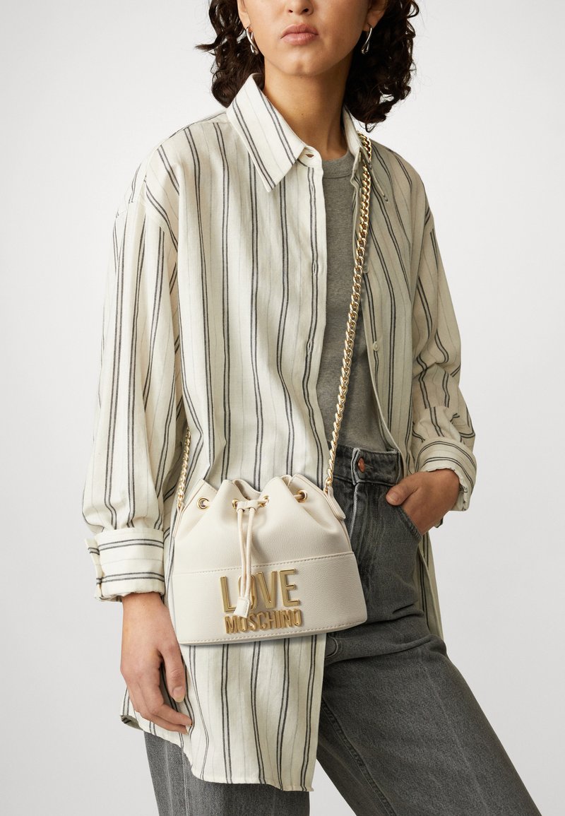Love Moschino LOVE LETTERING Across body bag avorio/offwhite