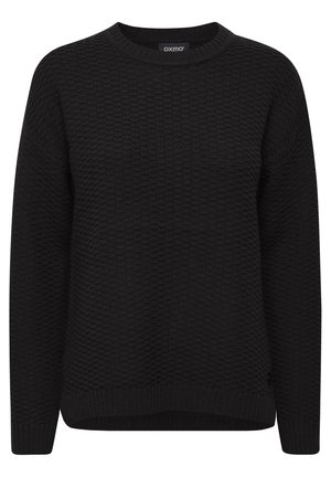 Pull noir en tricot avec un motif texturé, encolure ronde et poignets et ourlet côtelés. Présente une étiquette de marque discrète sur le côté.