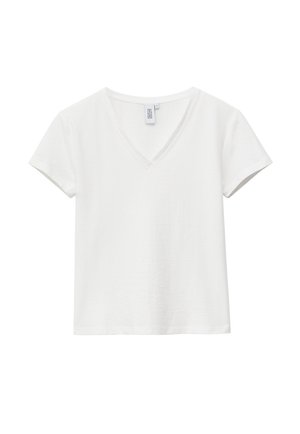 T-shirt blanc à manches courtes et col en V, coupe décontractée, présenté sur un fond blanc uni.