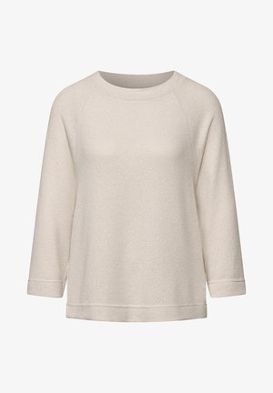 Lichtbeige trui met een textuur breiwerk, raglanmouwen en een ronde halslijn. Heeft een ontspannen pasvorm en zijsplitten aan de zoom.