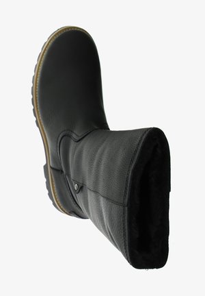 Black leather boot with a textured finish, circular silver button detail, and a soft, fur-lined interior. Features a rubber sole for traction.