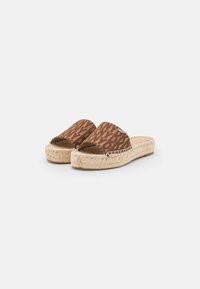 Espadrille sandals with a brown patterned fabric upper, open toe design, and jute-wrapped sole. Flat, casual style for warm weather.