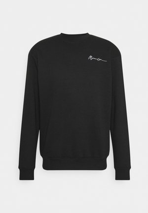 Sweat-shirt noir à manches longues avec col rond et petit logo blanc style signature sur le haut gauche de la poitrine.