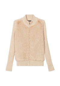 Veste zippée beige avec un devant en fausse fourrure douce et des manches côtelées. Présente un col montant et une finition lisse et texturée.