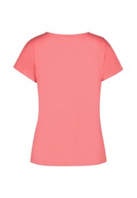 Koraalrode korte mouwen vrouwen t-shirt met een ronde hals, zachte textuur en een gladde afwerking. Eenvoudig ontwerp, zonder patronen of versieringen.