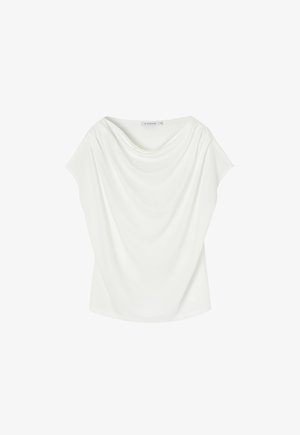 Balta bluzonė, apaugta drabužiu, su plačiu iškirpimu ir trumpomis rankovėmis. Pagaminta iš švelnios, glotnios medžiagos, pasižymi laisvu siluetu ir plaukiojančiu dizainu.