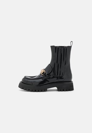 Stivaletti con plateau - black