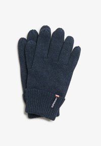 Guantes de lana en color azul marino con puños acanalados, que cuentan con una pequeña etiqueta de marca. El material es suave y el diseño incluye cinco dedos individuales.