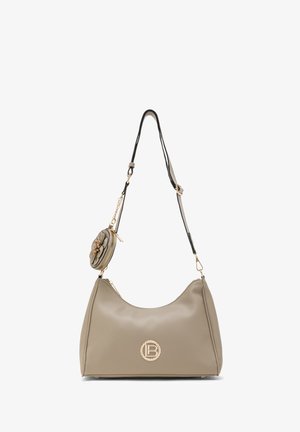 Beige schoudertas van kunstleer met een gebogen vorm, zwarte leren band en een afneembaar rond tasje met bloemmotieven en gouden details.