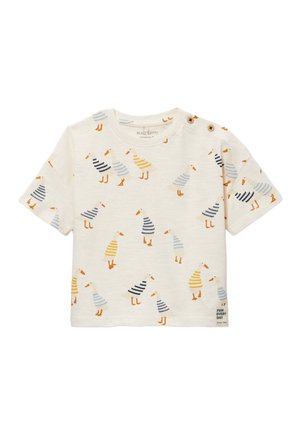 Chemise pour tout-petit de couleur crème à manches courtes, décorée d’illustrations de canards rayés en bleu, jaune et orange, avec des détails de boutons à l’épaule.