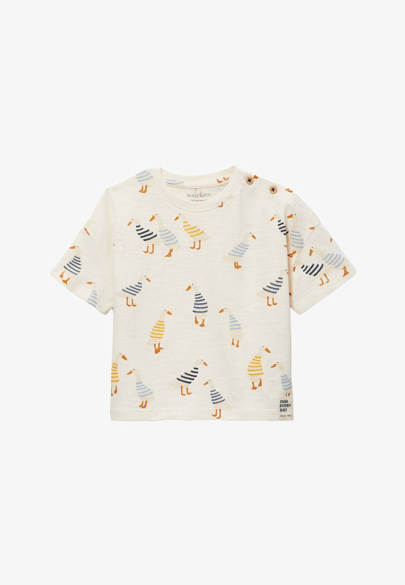 Chemise pour tout-petit de couleur crème à manches courtes, décorée d’illustrations de canards rayés en bleu, jaune et orange, avec des détails de boutons à l’épaule.