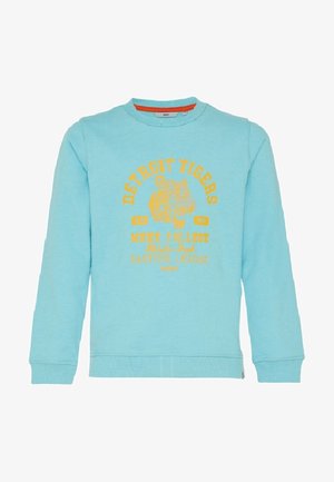 Jasnoniebieska bluza z długim rękawem z żółtym napisem "Detroit Tigers" oraz grafiką ryczącego tygrysa na środku, z prążkowaniem na mankietach i na dole.