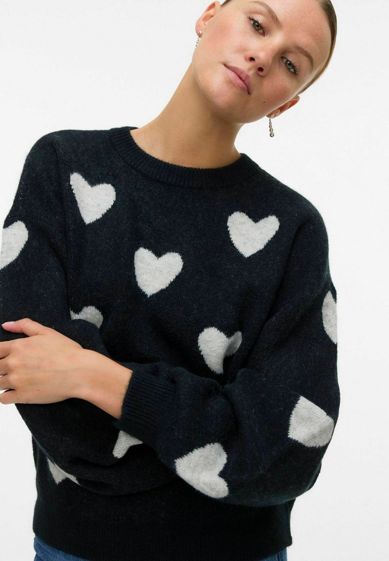 Coordinato con maglione e pantaloncini in maglia grigia