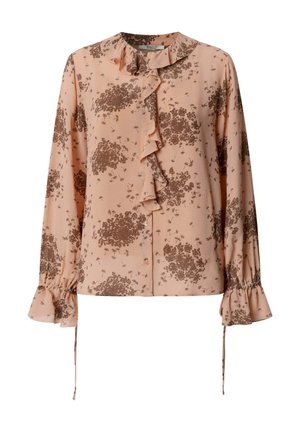 Blouse à manches longues couleur pêche avec imprimé floral marron, col et devant à volants, fermeture boutonnée, et poignets à volants avec liens.