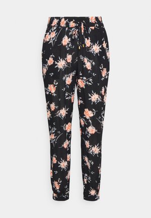 Black floral pants with an elastic waistband, featuring a floral pattern in peach and white. The fabric has a smooth texture and tapered legs.