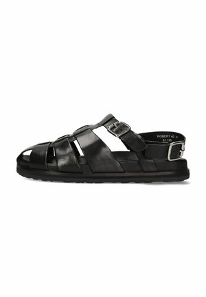 Sandales en cuir noir avec un design à bout ouvert, présentant des lanières croisées, une sangle à boucle à la cheville et une semelle texturée.