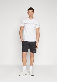 Tommy Hilfiger SMALL LOGO - Tepláky - black