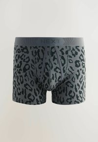 Gray boxer briefs featuring a black leopard print pattern. Elastic waistband with "NEXT" branding in a matching gray color.