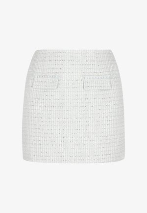 Bijela mini suknja od tweeda s teksturiranim završetkom, koja ima dva prednja džepa i suptilne plave šavne naglaske.