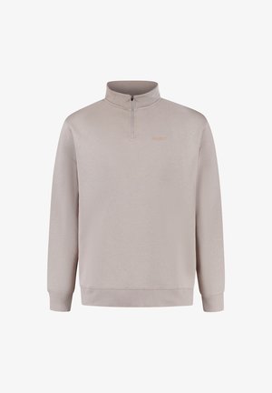 Lichtbeige kwart-rits sweatshirt met lange mouwen, ribbelmanchetten en een subtiel geborduurd logo op de borst. Zacht, textuurstof.