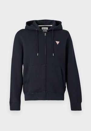 Navy blue zip-up hoodie made of cotton blend, featuring a kangaroo pocket, ribbed cuffs, and a small triangular logo on the chest.