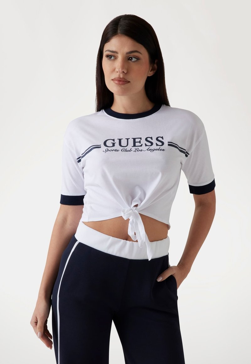 Guess - KNOTEN VORNE LOGO - Print T-shirt - weiß, Enlarge