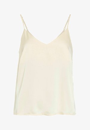 Haut débardeur couleur crème sans manches avec fines bretelles réglables et encolure en V.