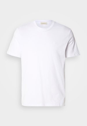 Tricou alb cu mânecă scurtă, realizat din bumbac moale. Are un guler rotund și un logo mic, discret pe piept.