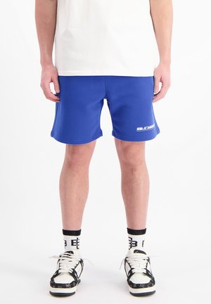 Blauwe sportshorts van een lichtgewicht stof, met een elastische tailleband en een klein wit logo op de linkerdij.