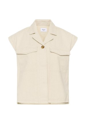 Cream short-sleeve shirt jacket with notch collar, two flap chest pockets, and single wooden button closure, labeled Saint.