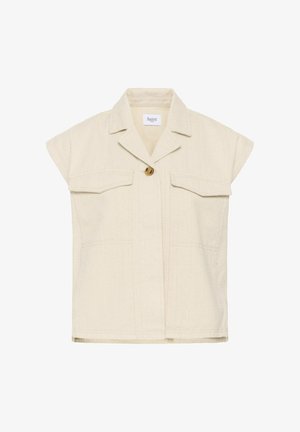 Cream short-sleeve shirt jacket with notch collar, two flap chest pockets, and single wooden button closure, labeled Saint.
