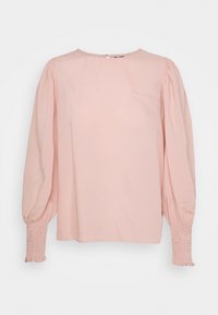 Chemisier rose clair avec un col rond, des manches longues à bouffantes et des poignets smockés. Fabriqué en tissu lisse avec une coupe ample.