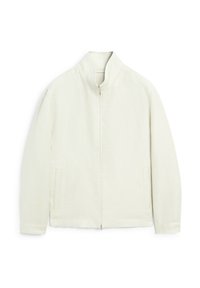 Giacca zip con colletto alto di un beige chiaro, con tasche frontali e un tessuto liscio e leggermente strutturato. Design semplice e moderno.