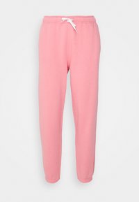 Růžové bavlněné tepláky s elastickým pasem a šňůrkou. Žebrované manžety, hladká textura, rovný střih. Bez výrazných vzorů nebo akcentů.