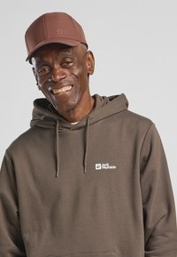 Jack Wolfskin STORM - Pet - dark rust