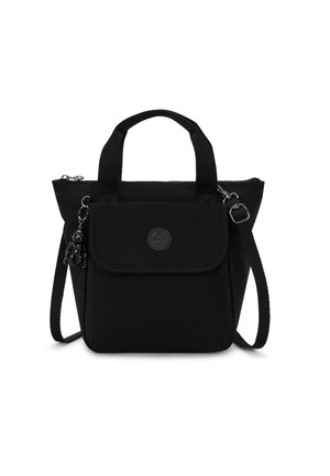 Compact black bag made of nylon, featuring short handles and a detachable shoulder strap. Includes a front flap pocket and a decorative charm.
