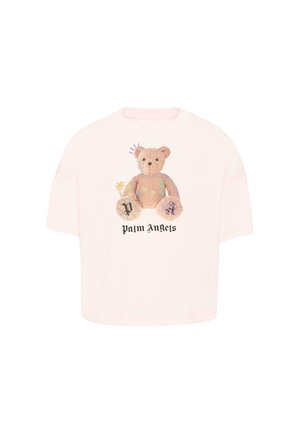 Chemise rose clair à manches courtes avec un graphisme détaillé d'ours en peluche et le texte "palm angels" en dessous sur le devant.