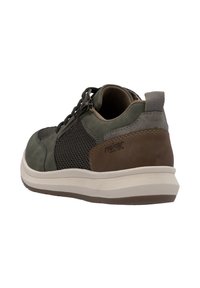 Men's sneaker in dark green leather and mesh, features a padded collar, gray accents, and a beige rubber sole with textured detailing.