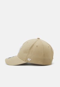 Khaki baseball cap made of cotton, featuring a curved brim, embroidered logo on the front, and small white detailing on the side.