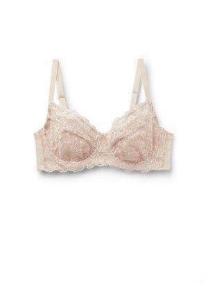 Beżowy koronkowy biustonosz z regulowanymi ramiączkami, fiszbinami i kwiatowym wzorem, ułożony płasko na białym tle.