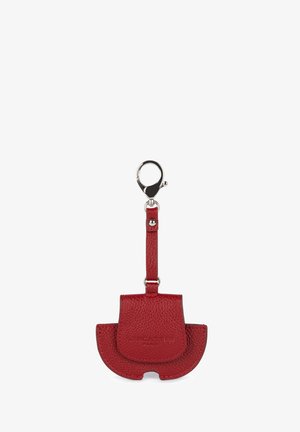 Red textured leather keychain holder with a clasp, featuring a rounded design and a flap closure. The material has a pebbled finish.