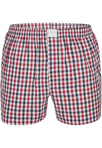Boxers à carreaux rouges, bleus marine et blancs avec une ceinture élastique et un seul bouton devant. Fabriqués en coton léger.