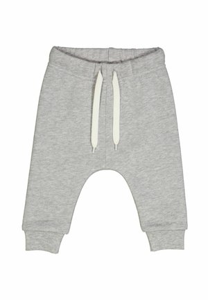 Hellgraue Sweatpants aus weichem Material. Mit einem elastischen Bund und weißen Kordeln sowie engen Bündchen an den Knöcheln.