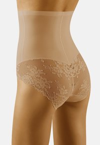 Beige high-waisted shapewear met bloemlise details aan de achterkant. Het materiaal is glad en semi-doorzichtig, wat zorgt voor een comfortabele pasvorm.